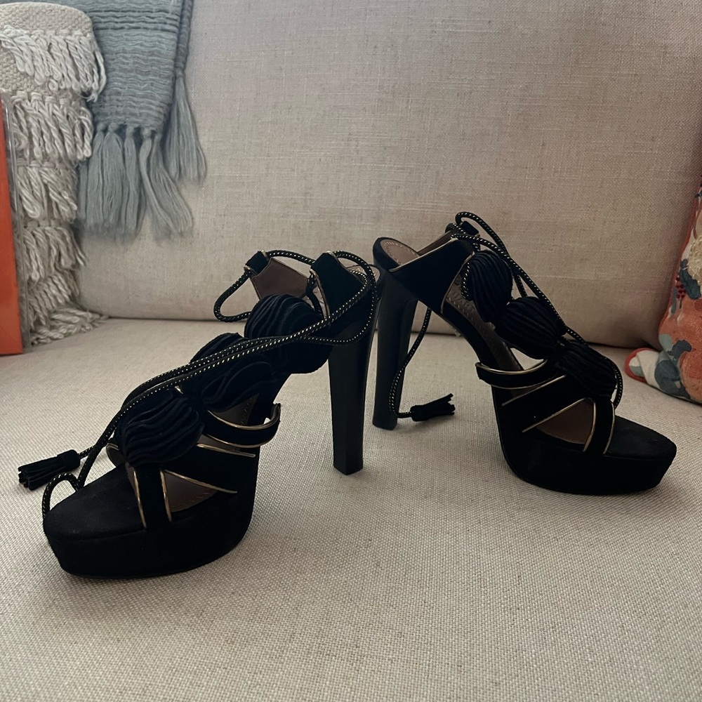 Black and gold platform heels